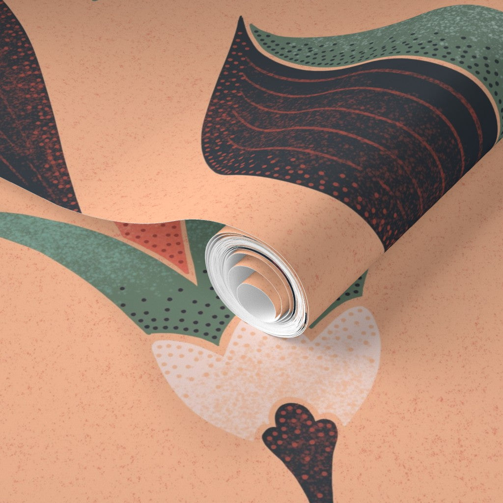 Roll of wallpaper with abstract patterns on a peach background