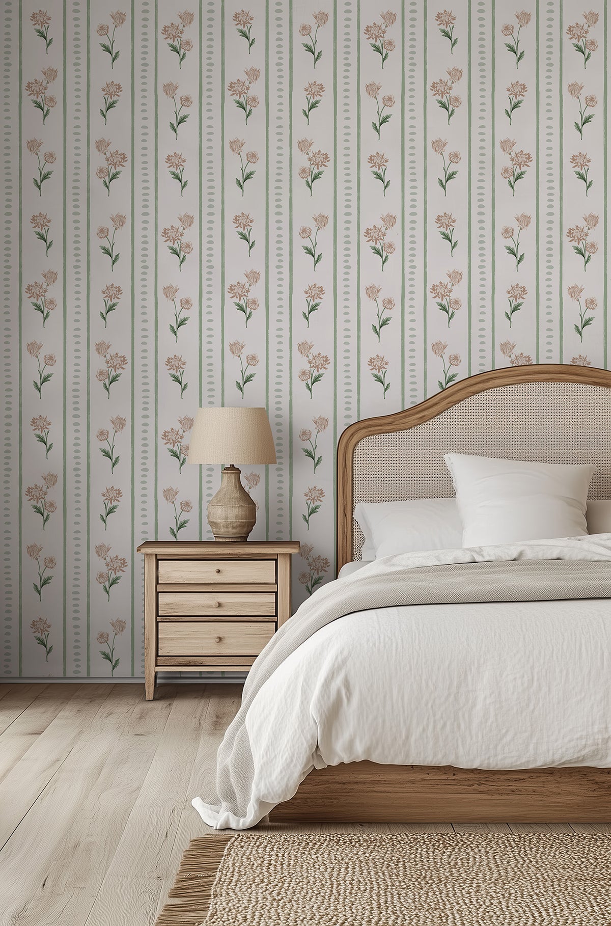 Bedroom with floral wallpaper, wooden nightstand, and bed with white bedding.