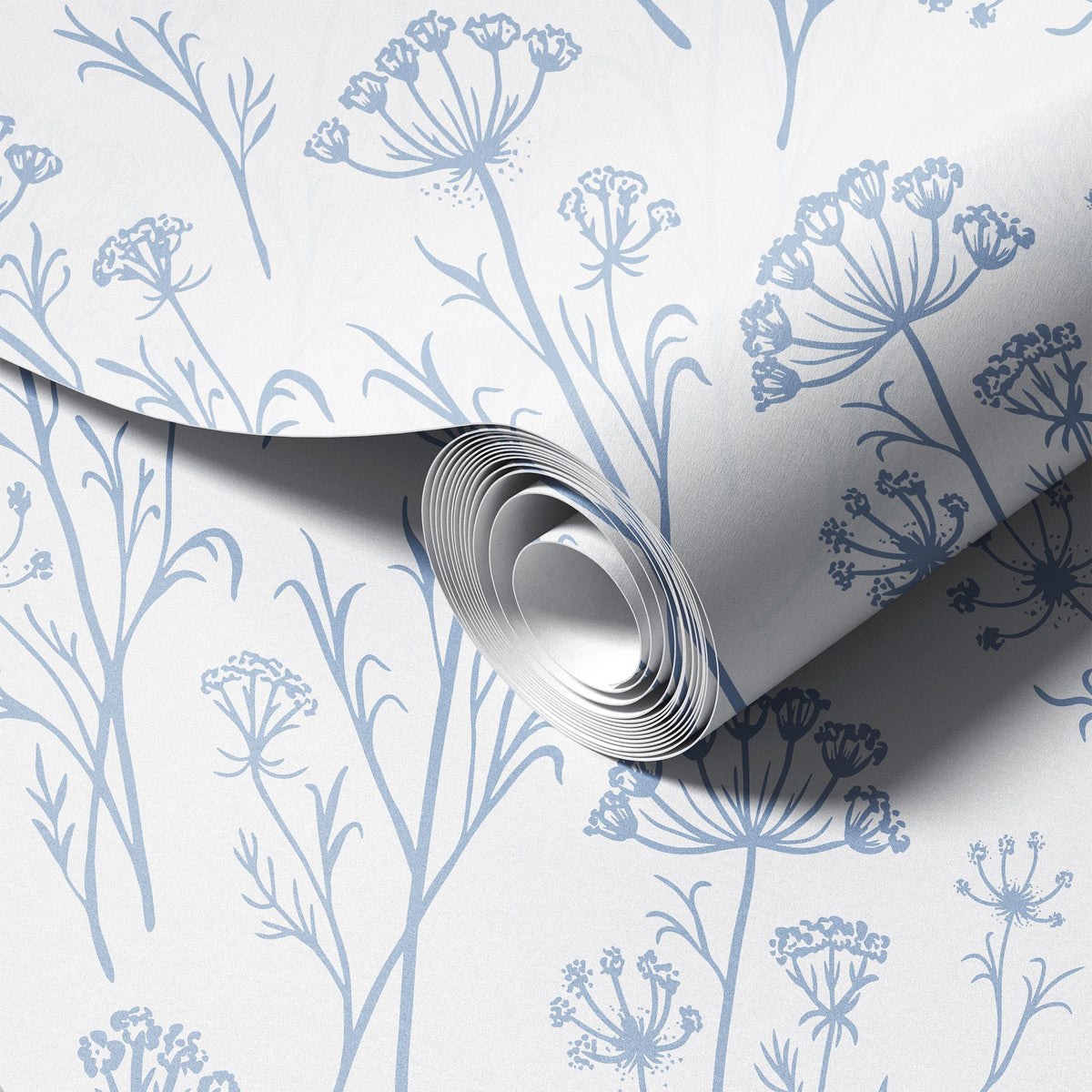 Roll of wallpaper with blue floral pattern on a white background