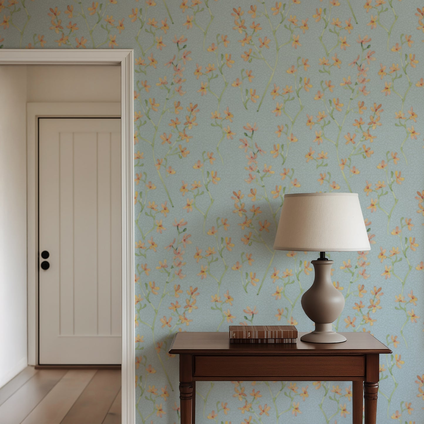 Room interior with floral wallpaper, wooden table, and lamp.