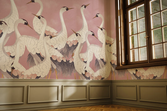 Wallpaper with crane design in a room with wooden flooring and a window.