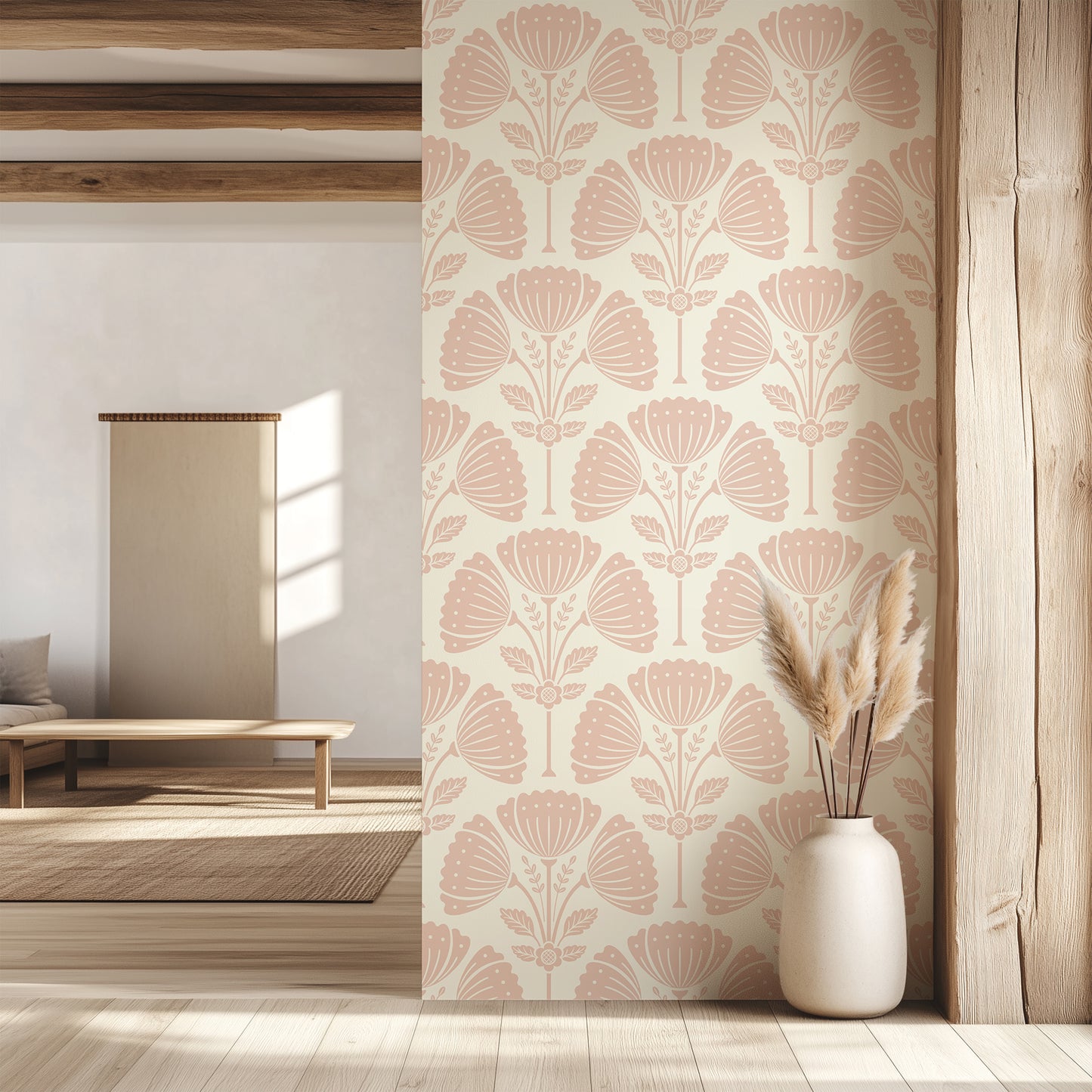 Living room with floral wallpaper, wooden floor, and white vase with dried plants.