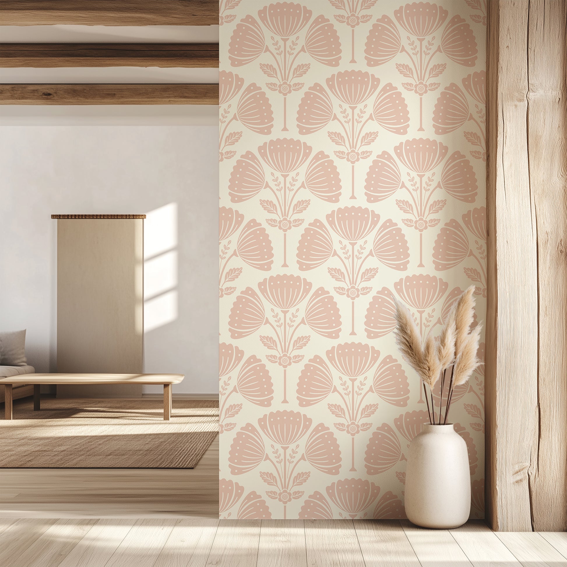 Living room with floral wallpaper, wooden floor, and white vase with dried plants.