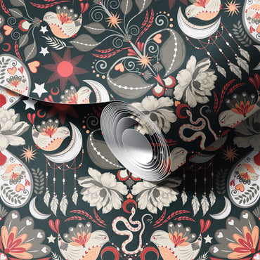 Decorative paper with celestial and nature-themed designs on a dark background