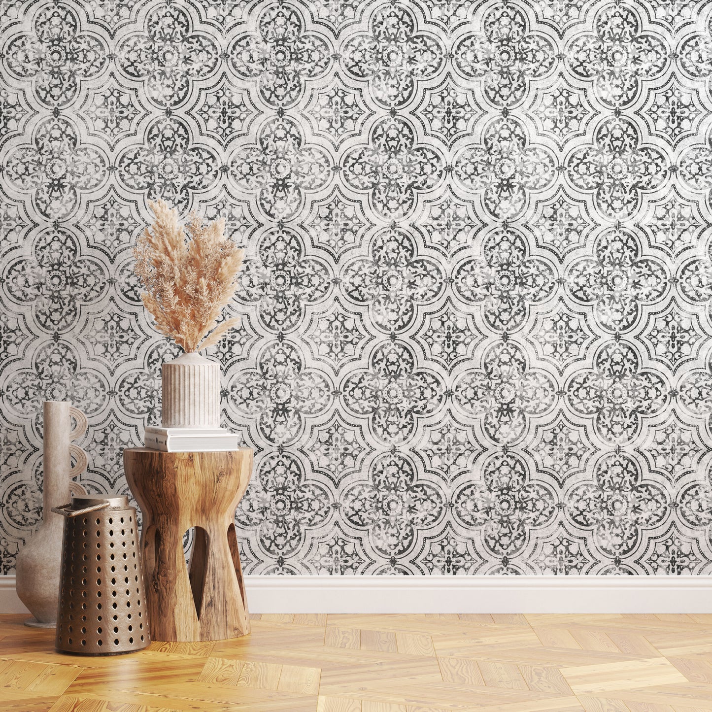 Decorative wallpaper with a geometric pattern in a room with wooden flooring and decorative items.