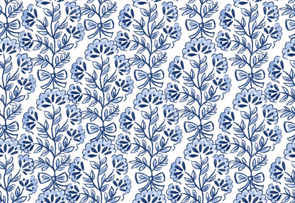Blue floral and bow pattern on a white background