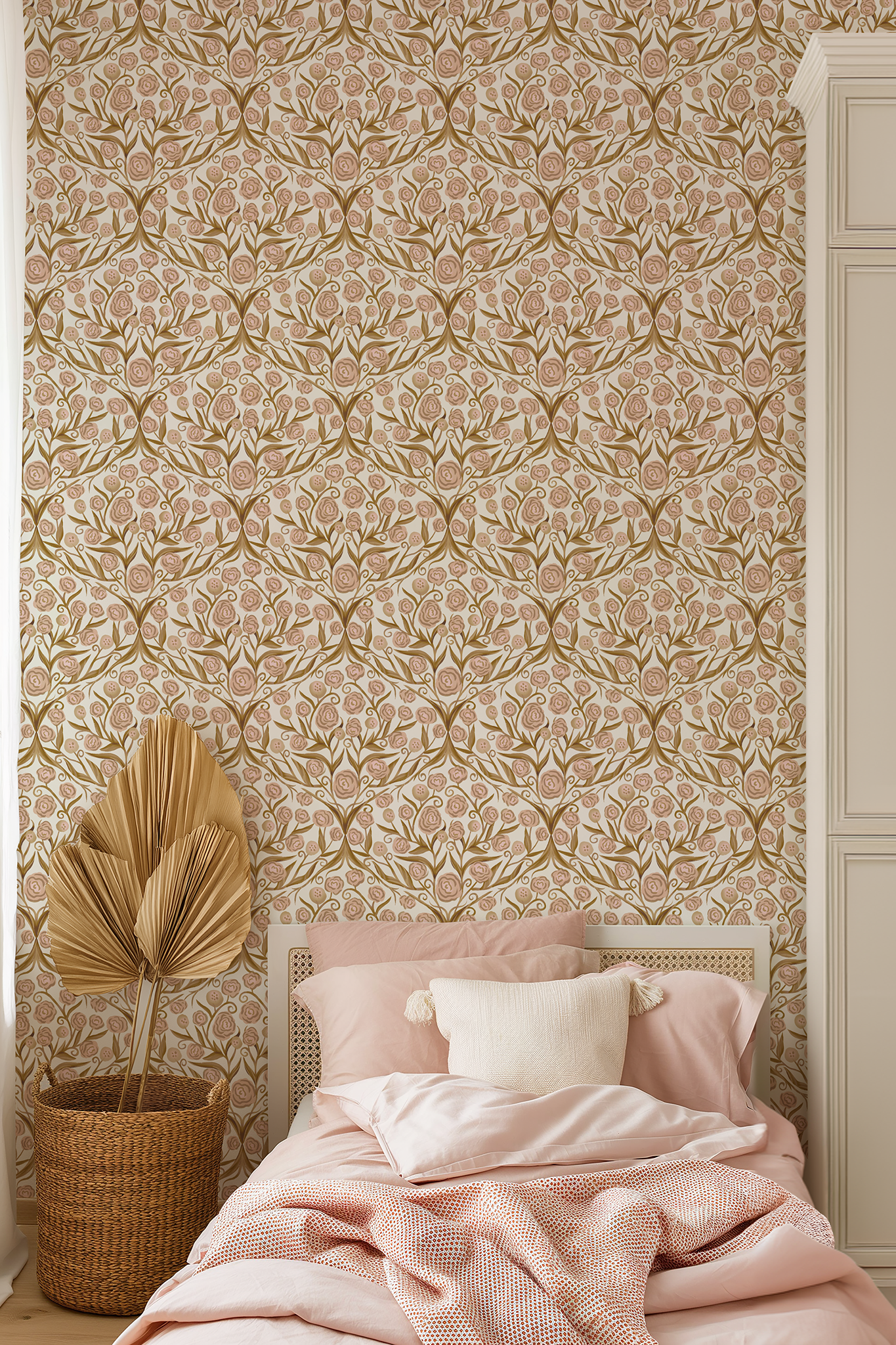 Bedroom with floral wallpaper, pink bedding, and a plant.