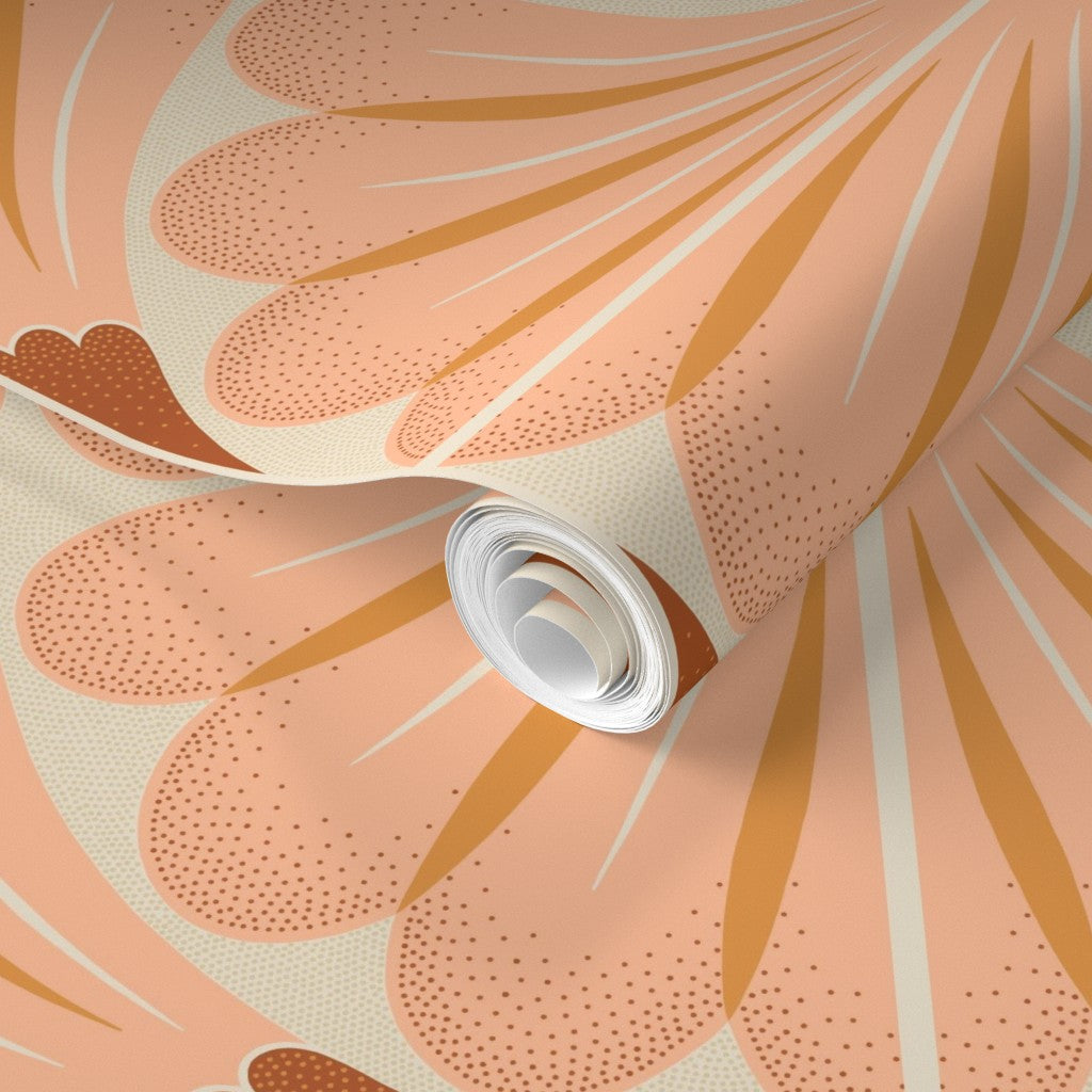 Roll of wallpaper with a floral pattern on a peach background