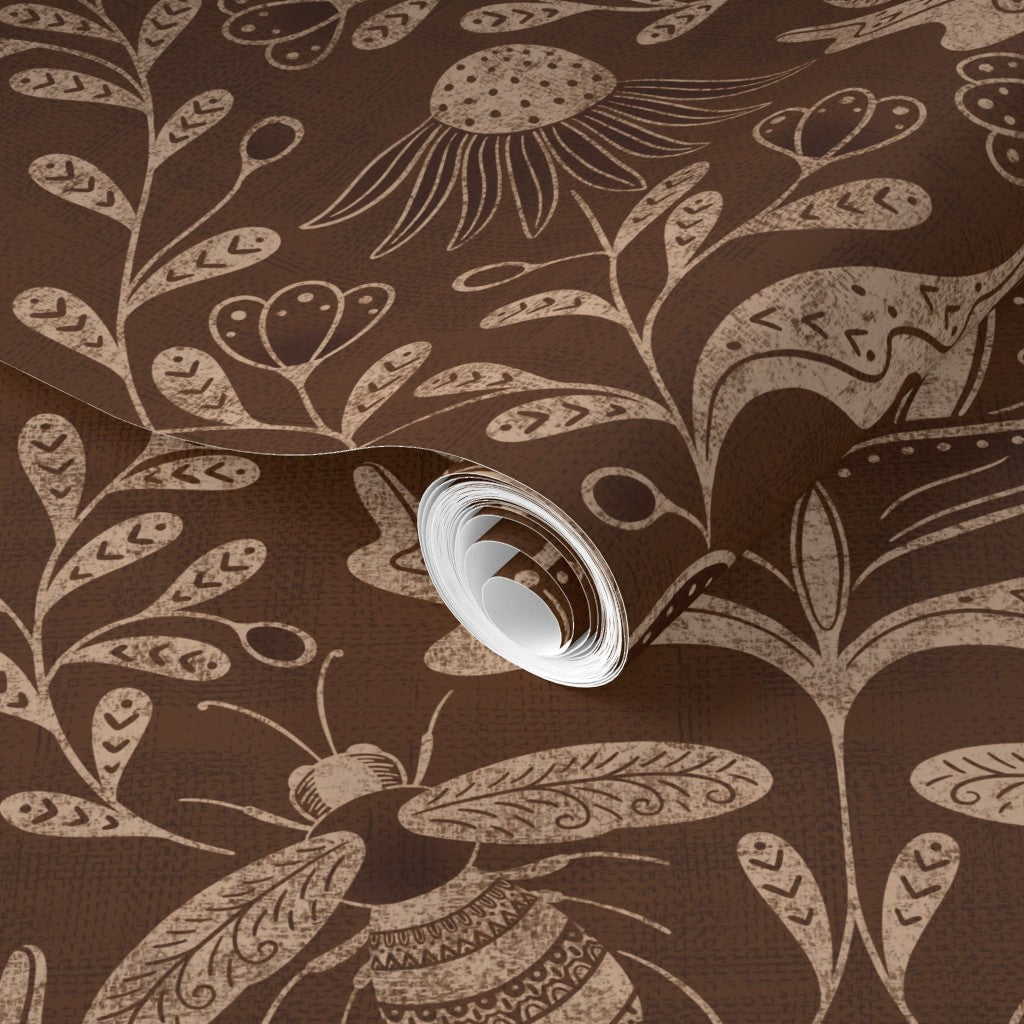 Close-up of a floral patterned wallpaper with a light switch.