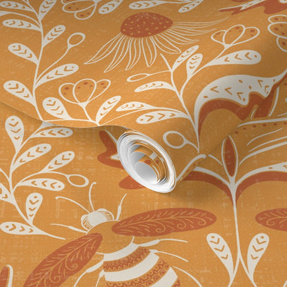 Roll of wallpaper with floral pattern on an orange background