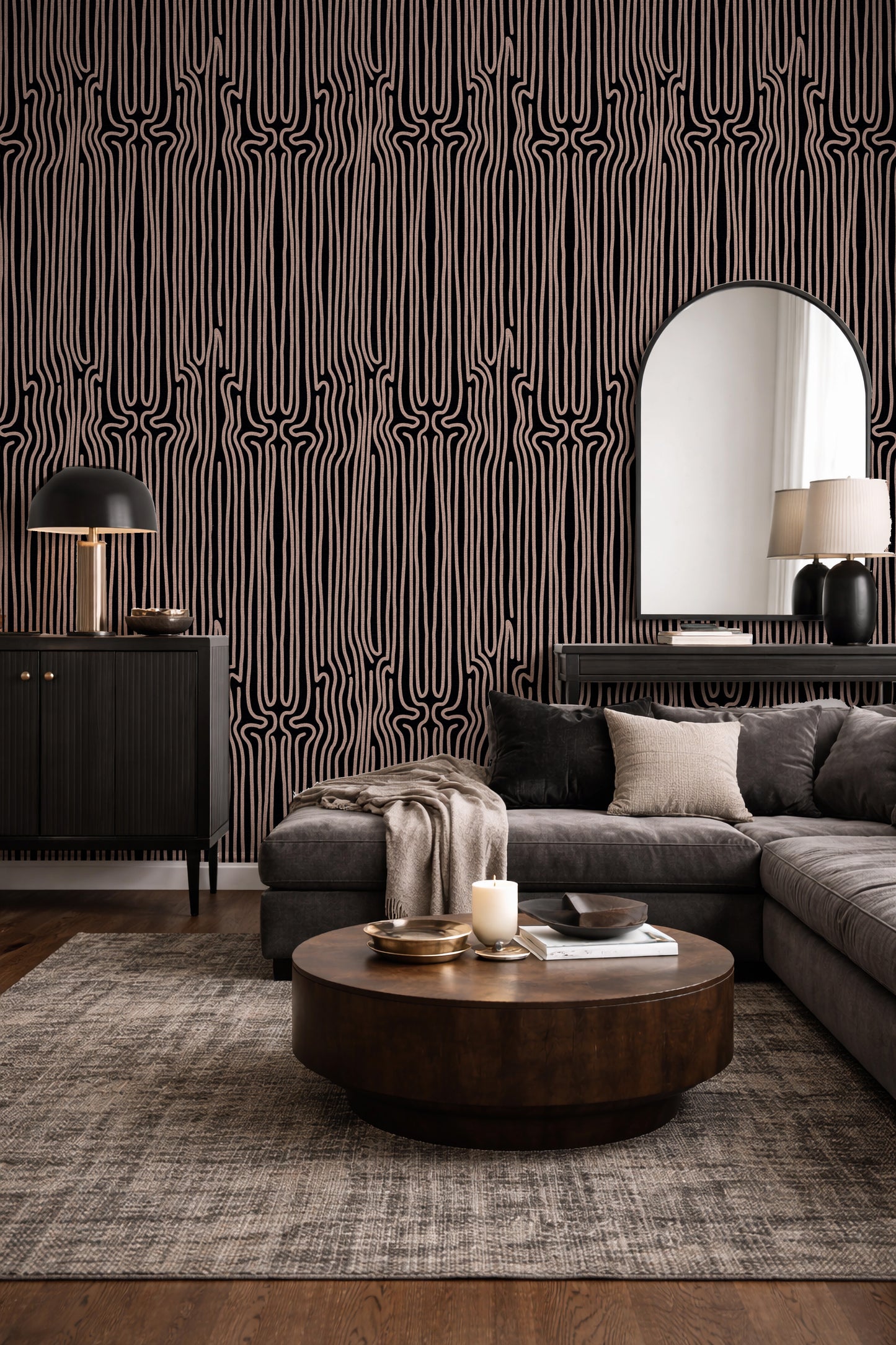 Modern living room with gray sectional sofa, wooden coffee table, and patterned wallpaper.