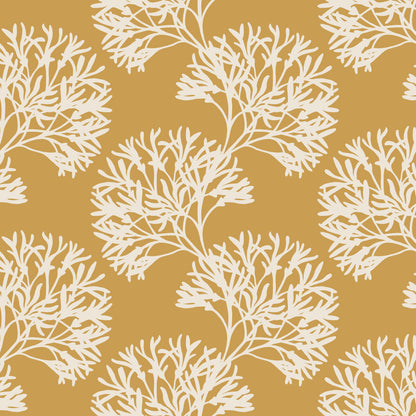 White coral pattern on a mustard yellow background