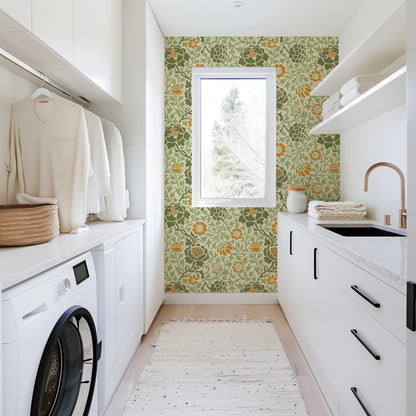 Modern laundry room with floral wallpaper, washing machine, and shelves.