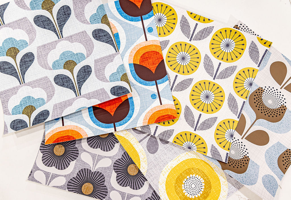 Collection of patterned fabric swatches with geometric designs in various colors.