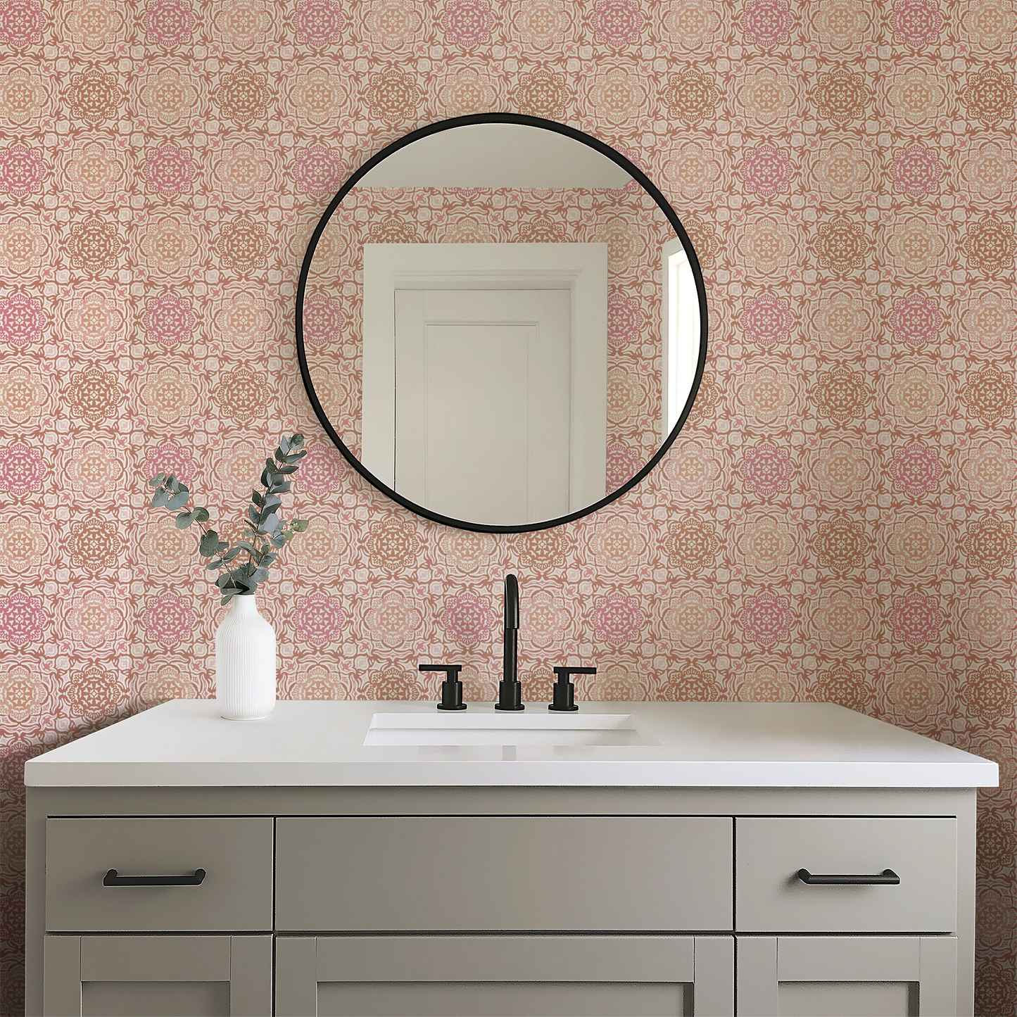 Bathroom vanity with round mirror and floral wallpaper