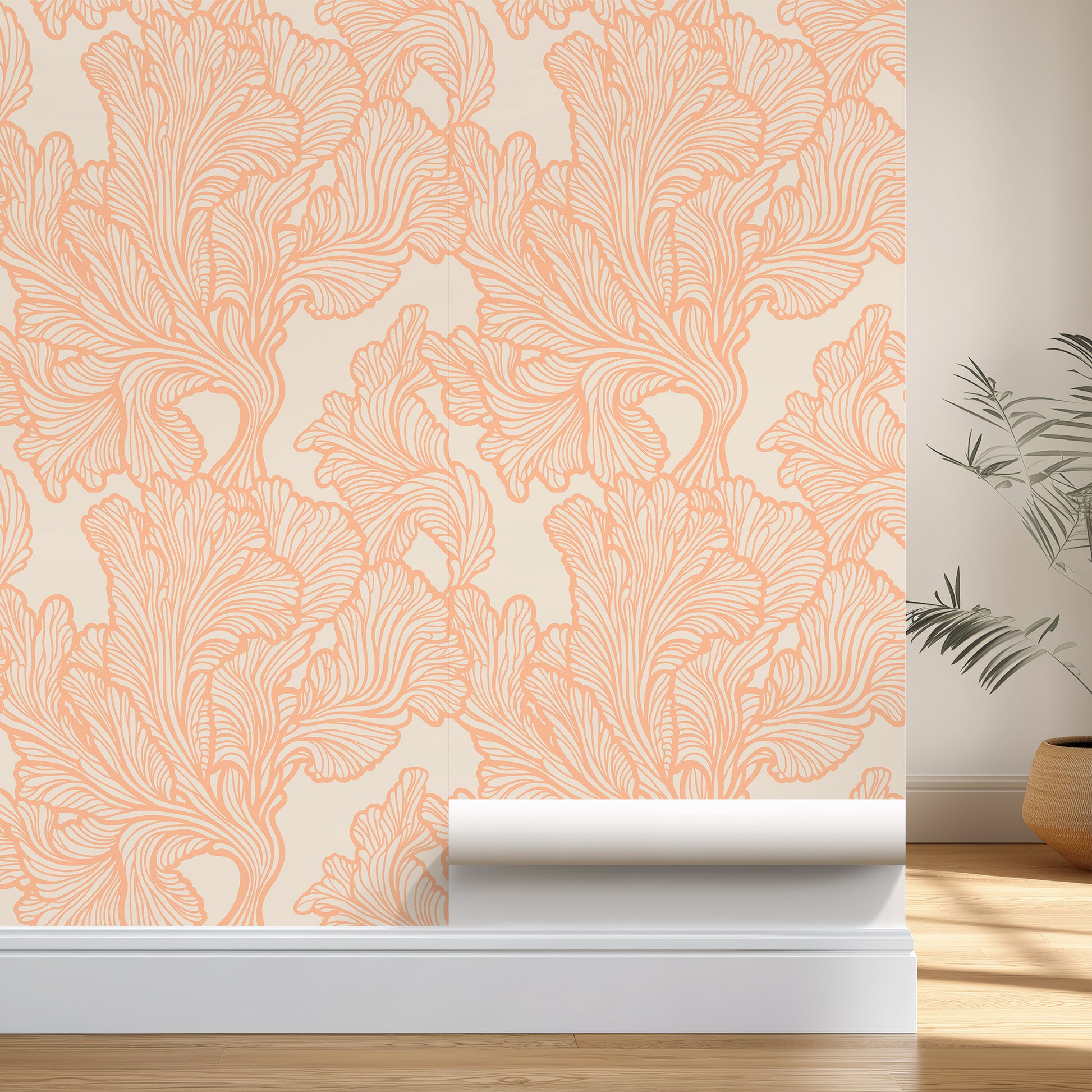 Roll of peach floral wallpaper on a neutral background