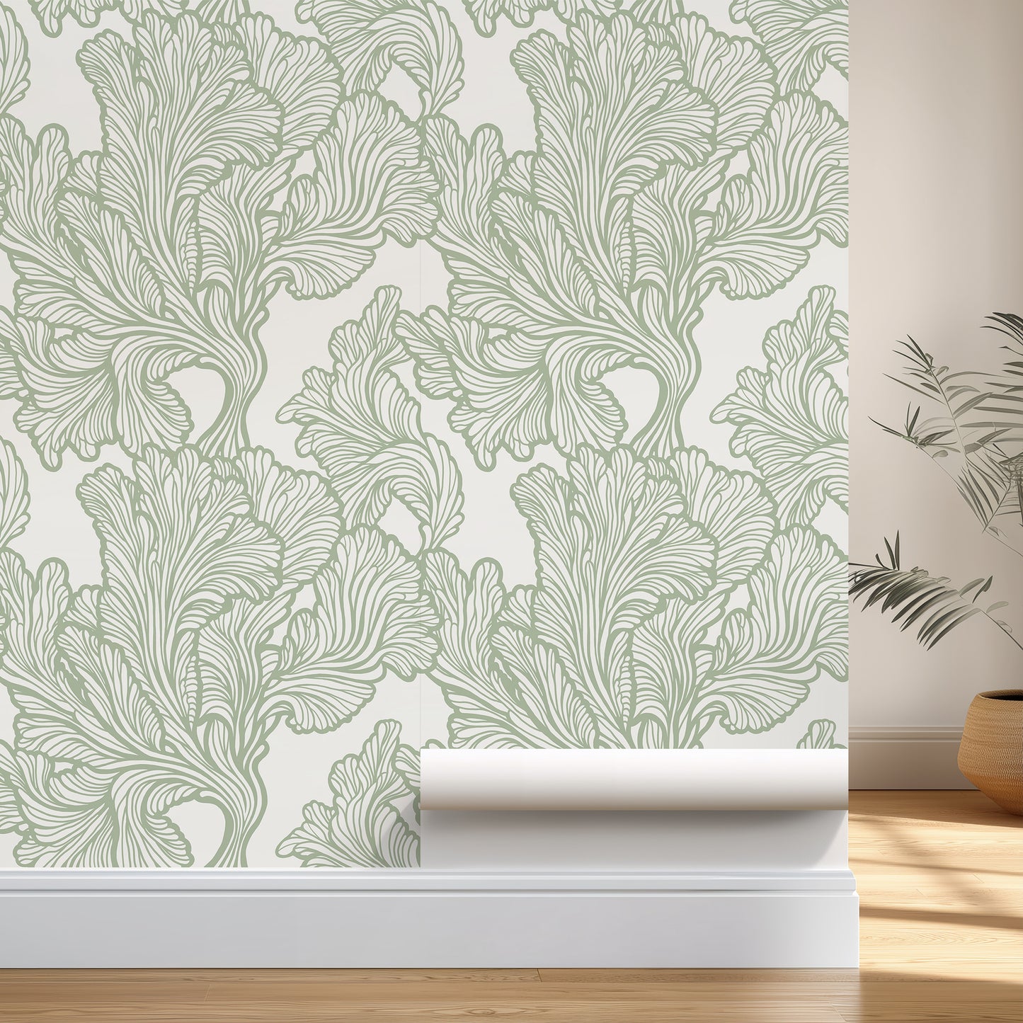 Roll of green leaf-patterned wallpaper on a neutral background