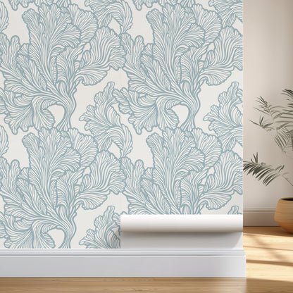 Roll of wallpaper with a leaf pattern on a neutral background