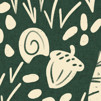 A close-up of a dark green fabric or wallpaper pattern featuring cream-colored hand-drawn style illustrations of an acorn, a spiral shell, leaves, and abstract organic shapes.