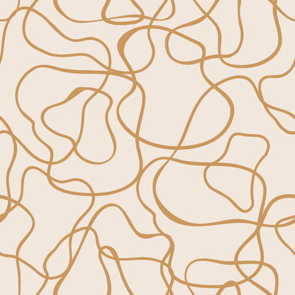 Gold abstract line pattern on a beige background