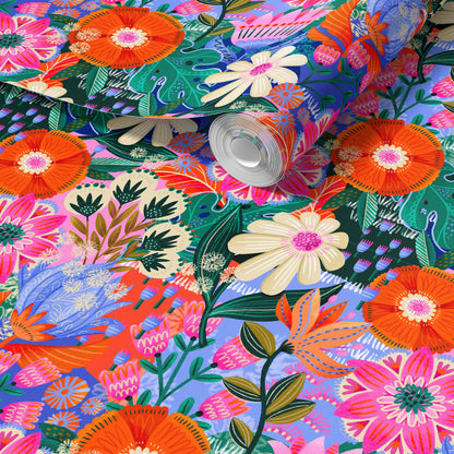 Roll of colorful floral wallpaper with vibrant flowers and leaves.