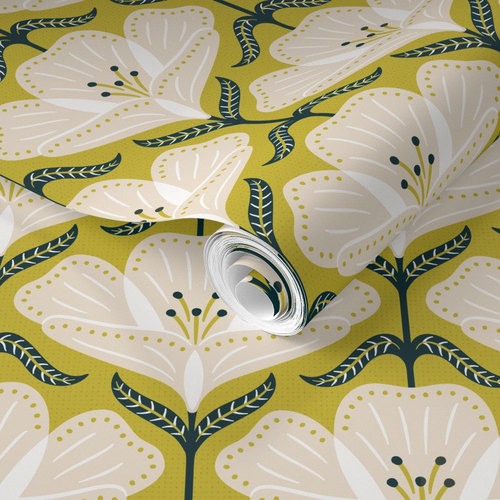 Roll of wallpaper with a floral pattern on a green background