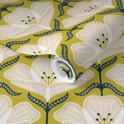 Roll of wallpaper with a floral pattern on a green background