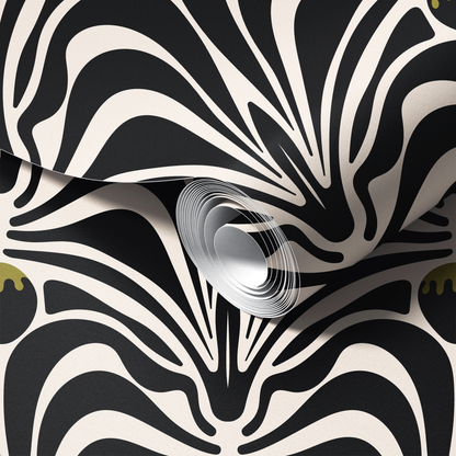 Roll of black and white patterned paper with a spiral design.