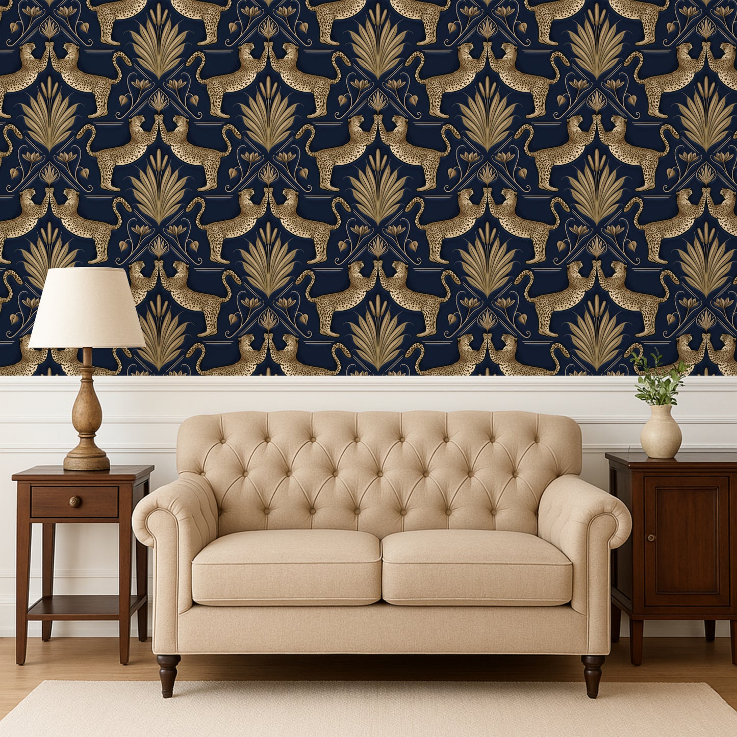 Beige sofa in a room with decorative wallpaper featuring gold and navy patterns.