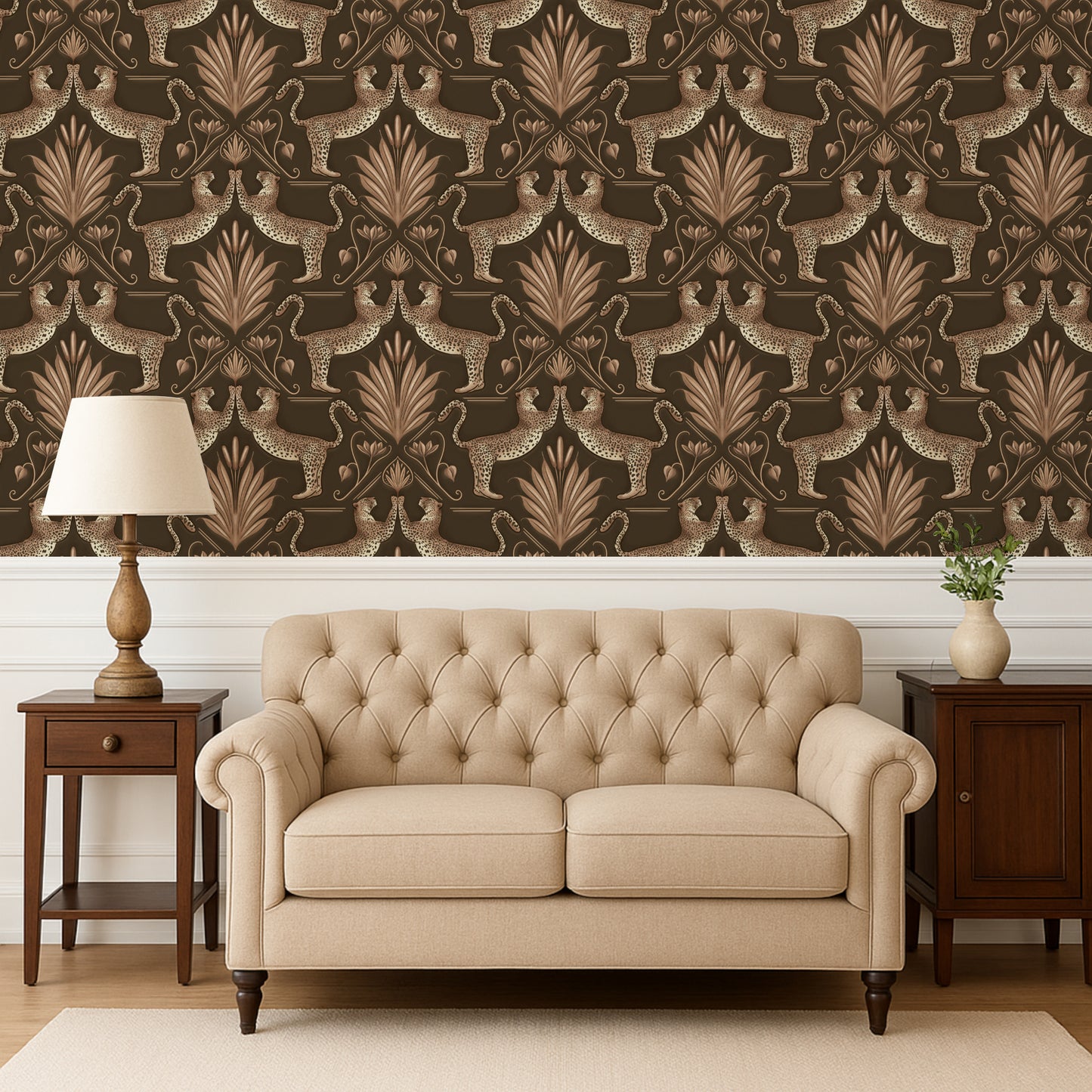 Beige tufted sofa in a room with patterned wallpaper and wooden furniture.