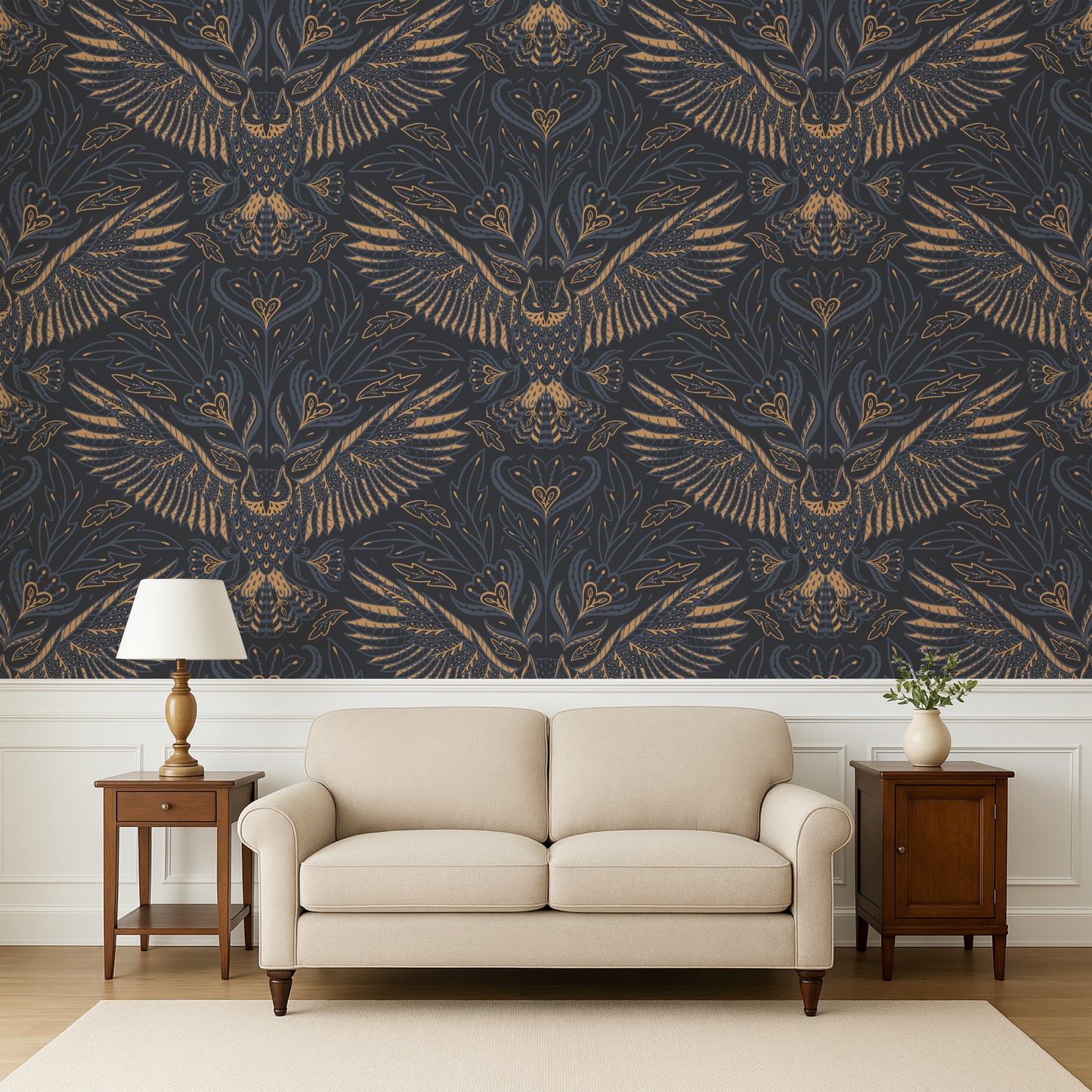 Beige sofa in a room with ornate wallpaper featuring large owl designs.