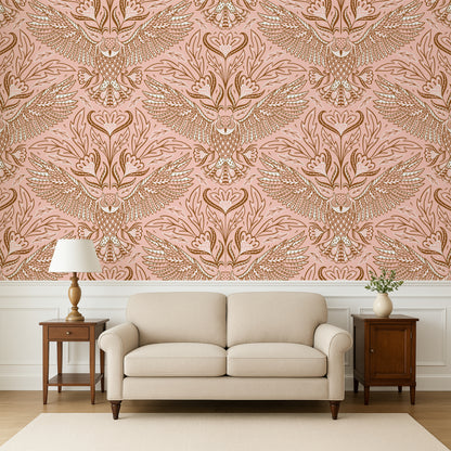 Living room with a beige sofa, wooden side tables, and a decorative wall with a pink and gold pattern.