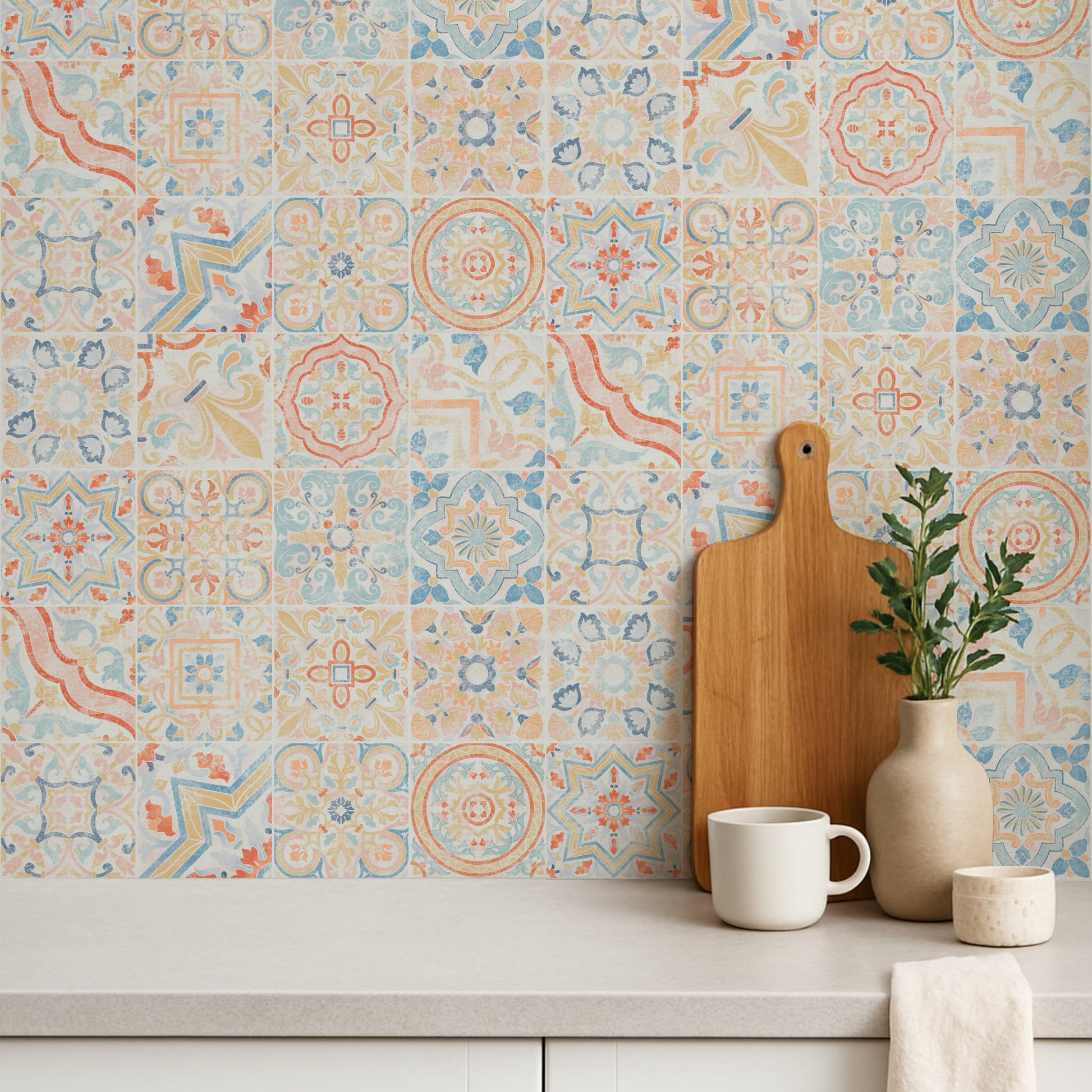 Decorative patterned wallpaper with a wooden cutting board, white mug, and plant on a shelf.