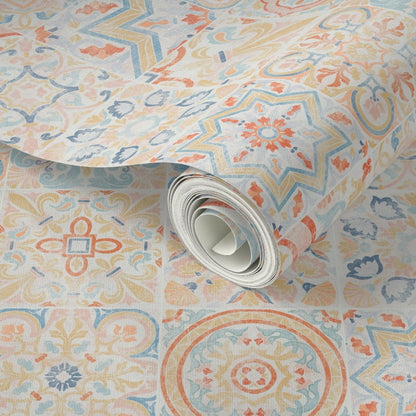 Roll of patterned wallpaper with geometric designs in pastel colors.