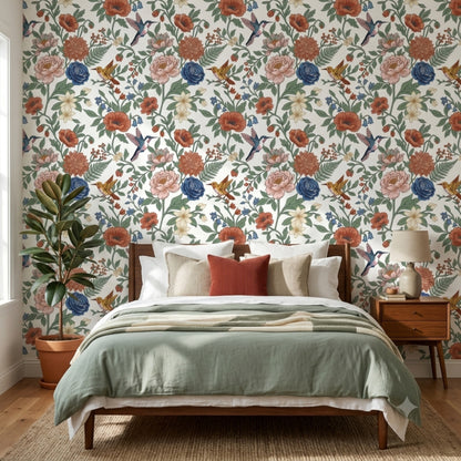 Whimsical Hummingbird Garden peel and stick wallpaper with colorful flowers and hummingbirds styled in a cozy bedroom.