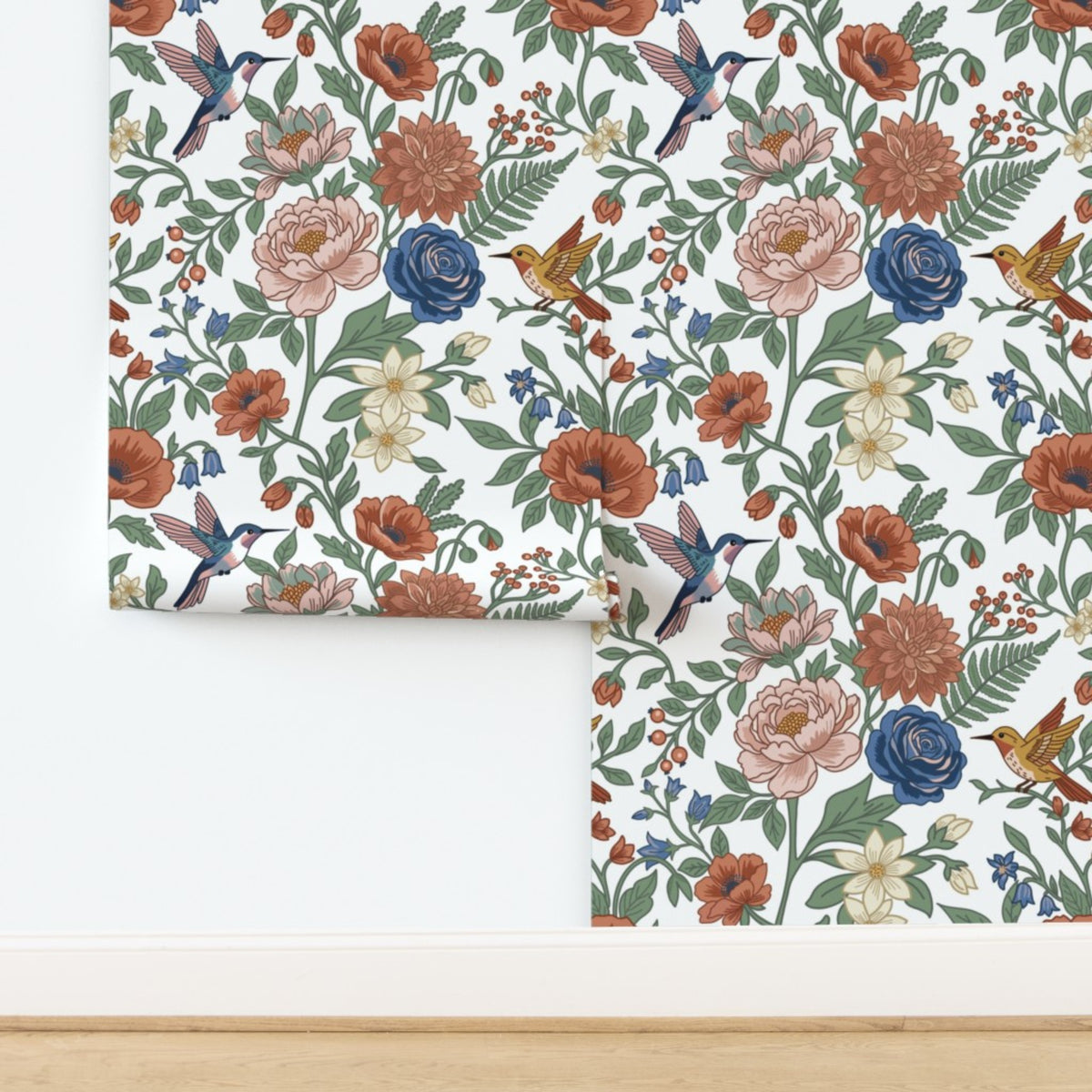 Whimsical Hummingbird Garden peel and stick wallpaper with colorful flowers and hummingbirds being installed on a blank wall
